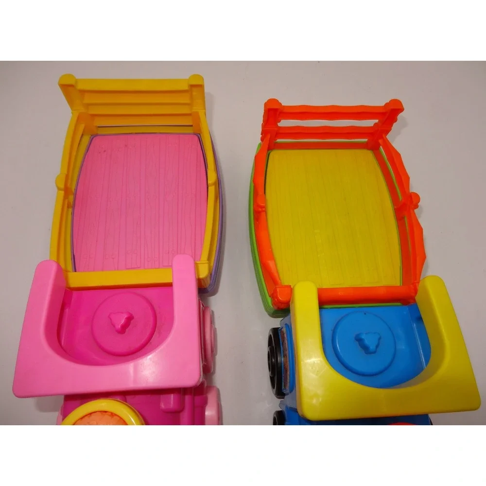 Fisher Price Little People Pink Musical Zoo Train and Musical Safari Train Set